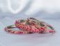 Preview: A set of three magenta-coloured Indian bangles with rhinestones and glitter